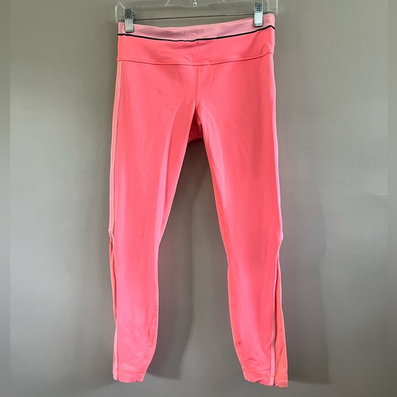 lululemon athletica Pants - Lululemon Run: Pace Tight
Pop Orange / Bleached‎ Coral Pink